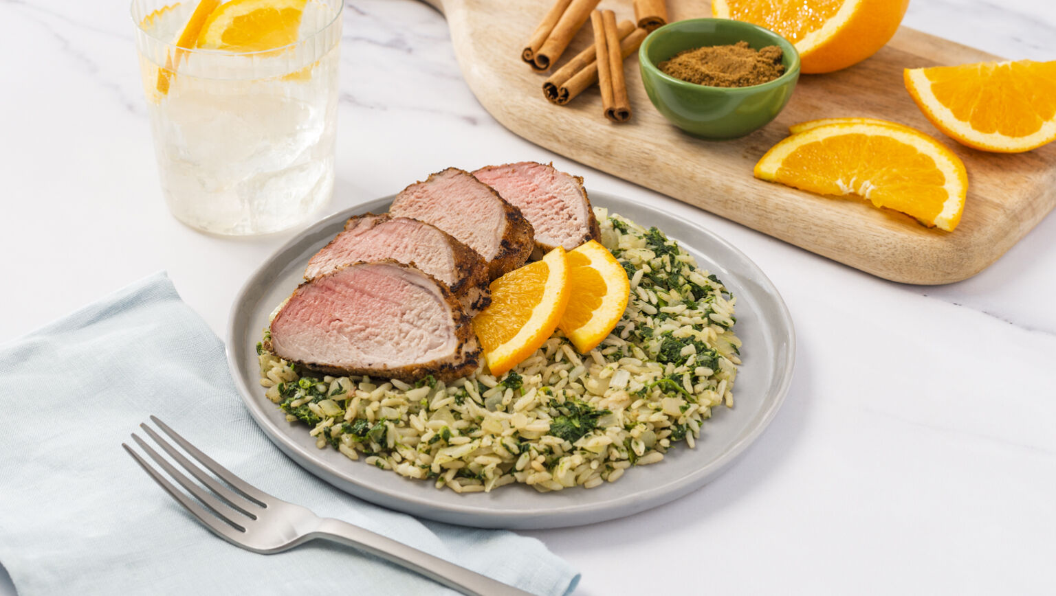 Cumin Rubbed Grilled Pork Tenderloin with Orange Cinnamon Rice Pilaf